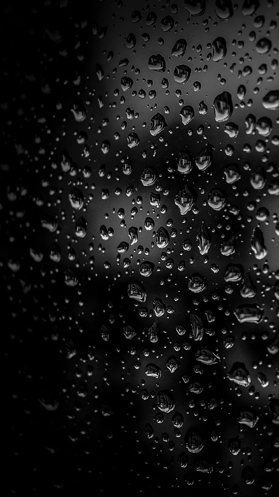 Monochrome Rain Droplets on Glass with Dramatic Black Background HD phone wallpaper
