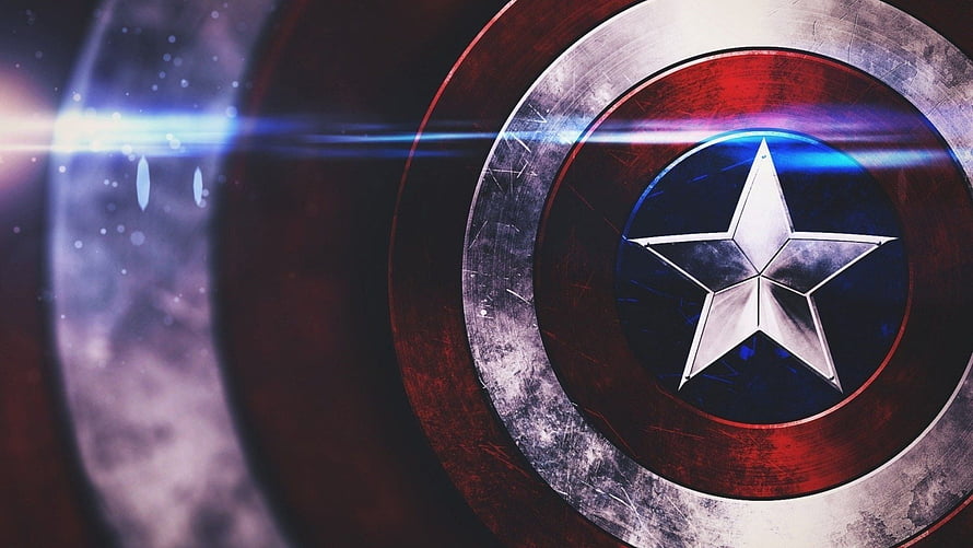 Captain America Shield Close-Up with Cosmic Lens Flare and Star Detail HD wallpaper