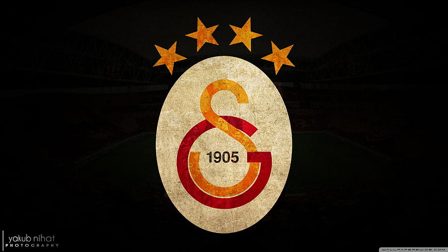Vintage Galatasaray S.K. Logo with Stars and Stadium Background HD wallpaper