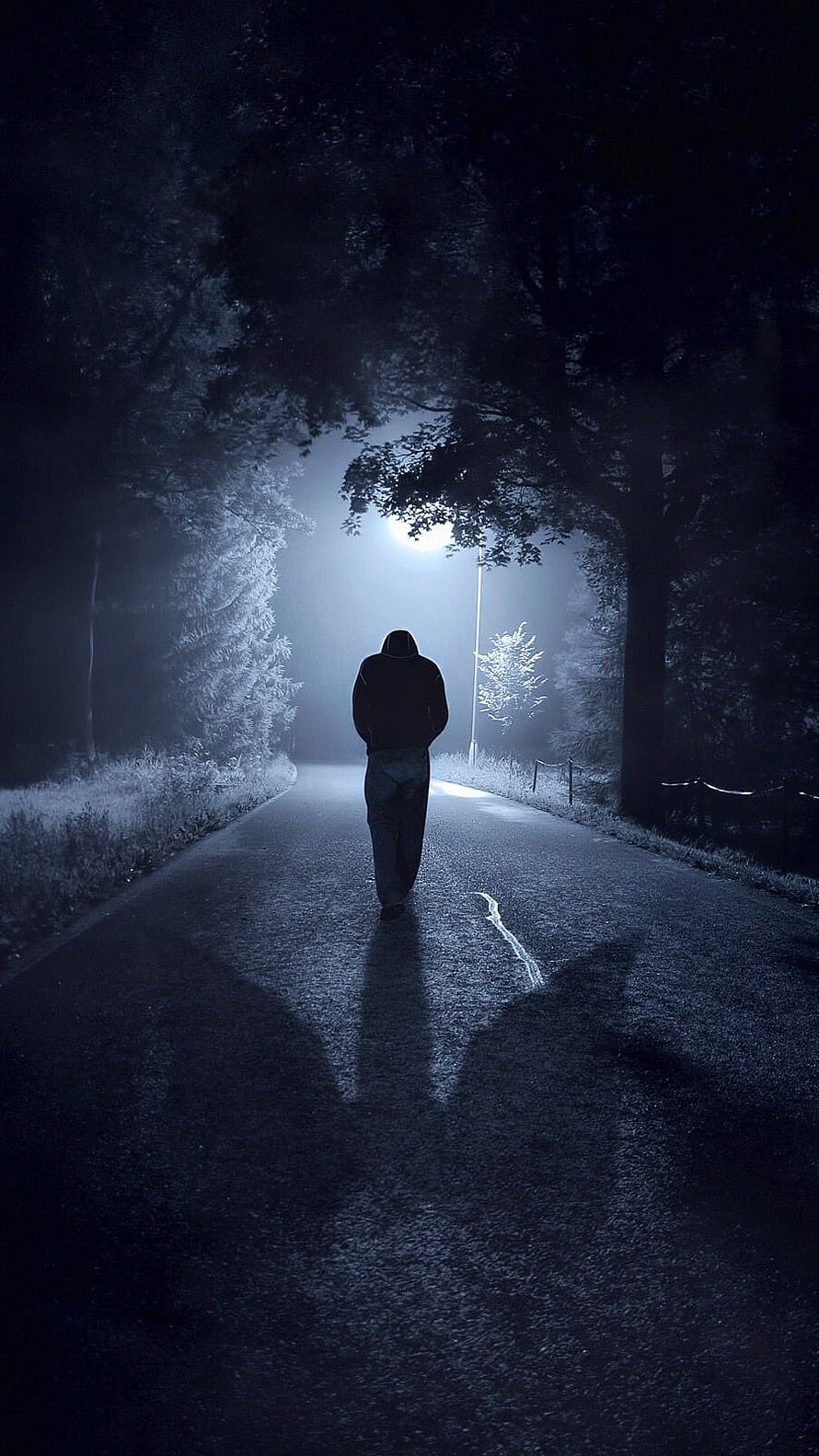 Lonely Hooded Figure Walking Down A Dark Foggy Road At Night HD phone wallpaper
