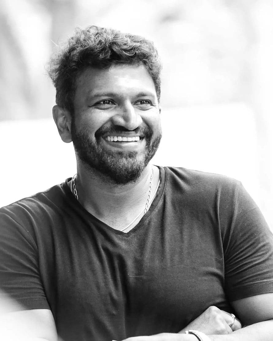 Puneet Rajkumar Black and White Portrait with Warm Smile and Beard HD phone wallpaper