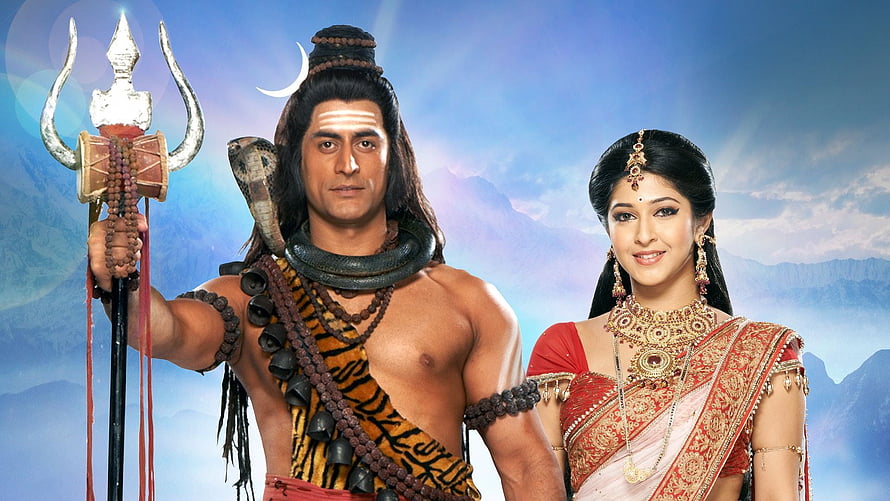 Devon Ke Dev Mahadev promotional artwork featuring Lord Shiva and Sati in traditional Indian attire HD wallpaper