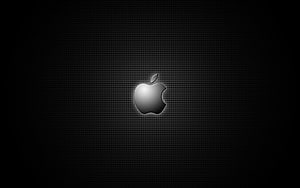 Apple Logo on Dark Perforated Metal Surface with Subtle Lighting HD wallpaper