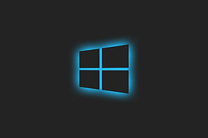 Glowing Blue Windows 10 Logo on Dark Background HD wallpaper