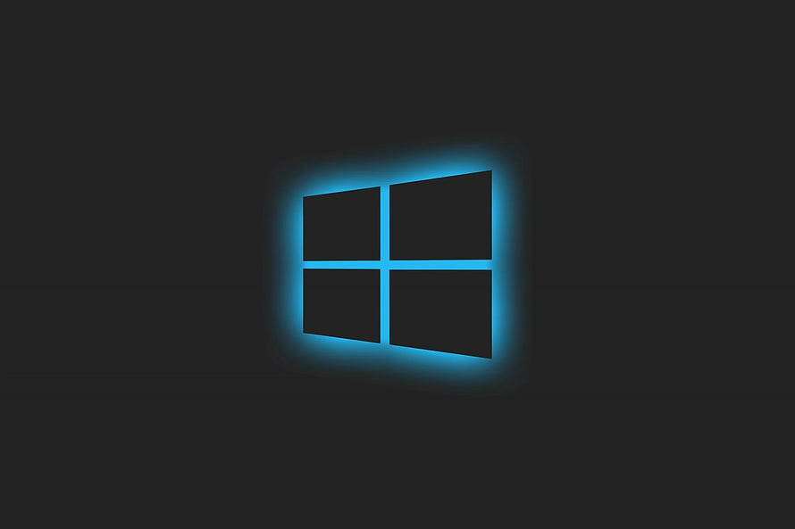 Glowing Blue Windows 10 Logo on Dark Background HD wallpaper