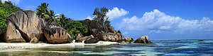 Tropical Island Beach with Giant Granite Boulders and Turquoise Water HD wallpaper