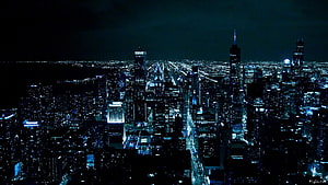 Aerial Night View of Manhattan Skyline with Glowing City Lights and Grid Streets HD wallpaper