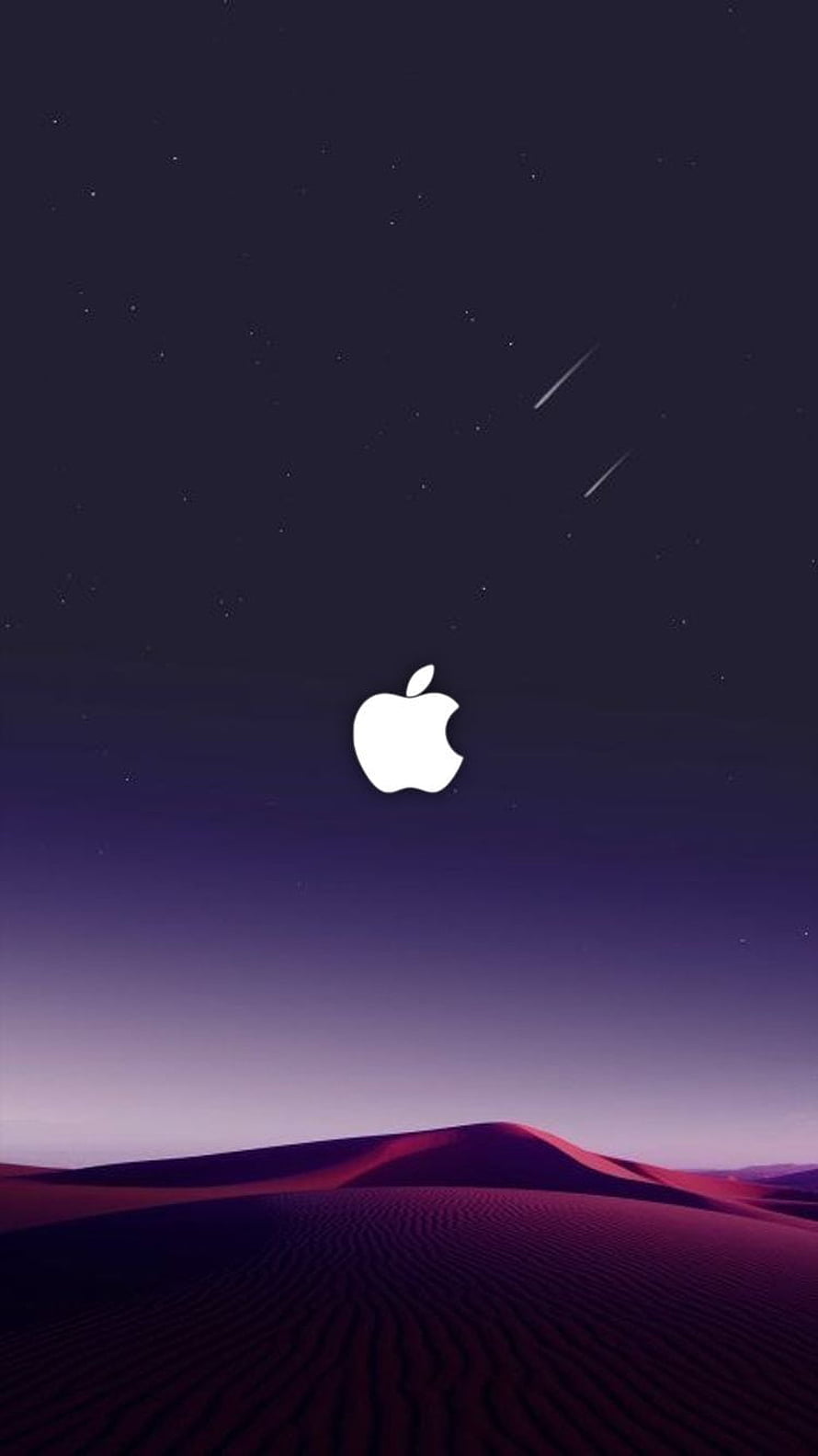 Apple Logo Over Purple Desert Dunes Under a Starry Night Sky with Shooting Stars HD phone wallpaper