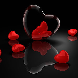 Glossy Red Hearts Inside Transparent Glass Heart on Black Reflective Surface HD phone wallpaper