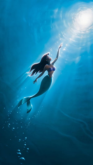 Ariel from The Little Mermaid Reaching Toward Sunlight in Deep Blue Ocean Waters HD phone wallpaper