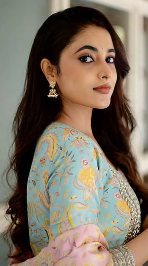 Jyothika in a Blue Floral Saree Portrait HD phone wallpaper