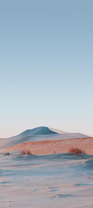 Minimalist Sand Dunes Landscape with Soft Pastel Sky and Warm Earth Tones HD phone wallpaper