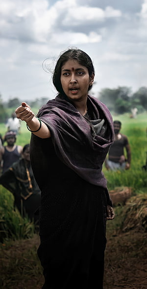 KGF Chapter 2 Mother Ma Pointing in Rural Field Scene HD phone wallpaper