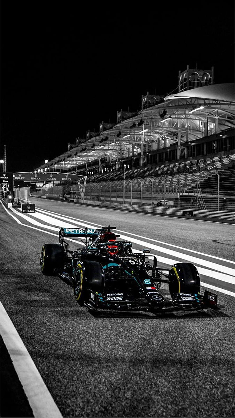 Mercedes Petronas Formula 1 Race Car on Night Circuit HD phone wallpaper