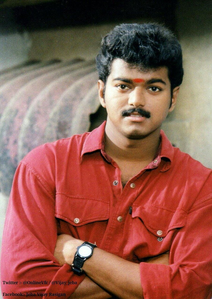 Vijay in a red shirt with a mustache and bindi, vintage portrait with arms crossed HD phone wallpaper