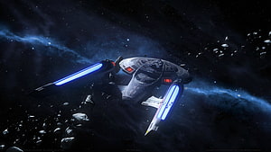 Star Trek Enterprise NCC-1701-E navigating through an asteroid field with glowing warp nacelles HD wallpaper