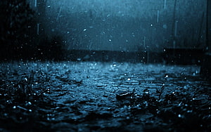Macro Photography of Raindrops Splashing on Wet Ground in Dark Blue Tones HD wallpaper