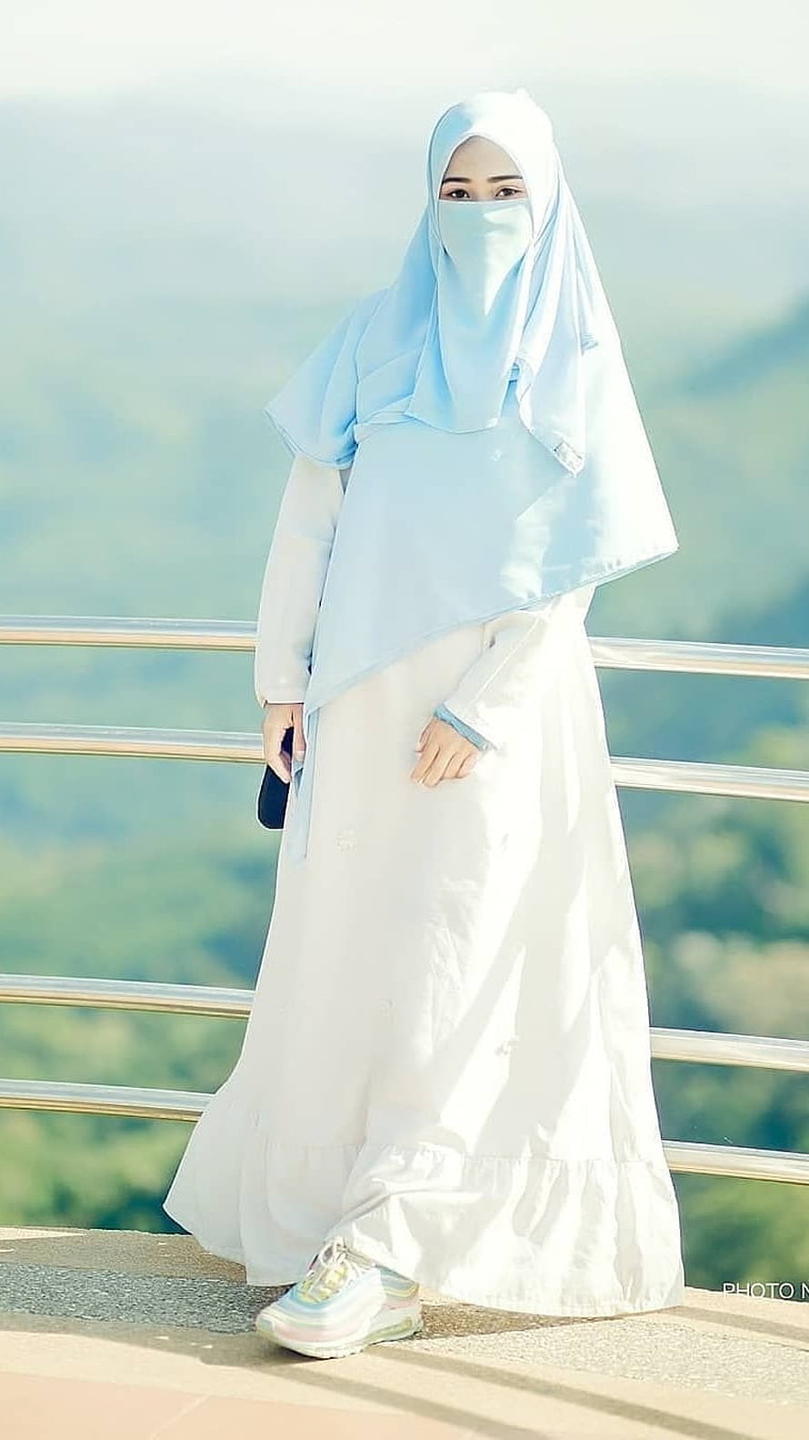 Elegant Muslim Woman in White Abaya and Light Blue Hijab Standing on a Scenic Balcony, Muslim Girl , White Gurkha HD phone wallpaper