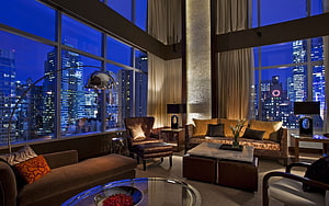 Luxury Penthouse Living Room With Panoramic City Skyline View At Dusk HD wallpaper