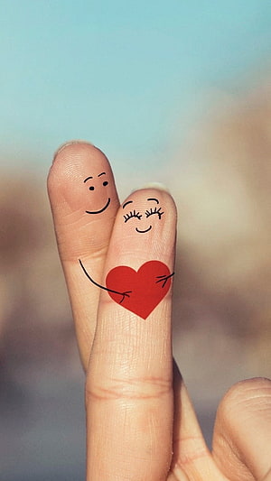 Cute Finger Couple Holding a Red Heart with Simple Face Drawings HD phone wallpaper