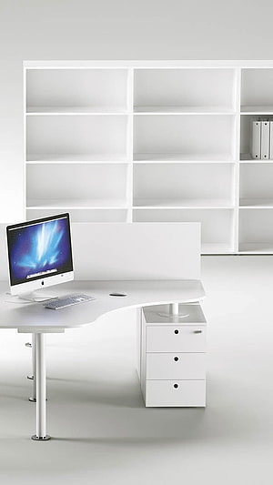 Minimalist White Office Desk with Curved Design and Matching Storage Drawers HD phone wallpaper