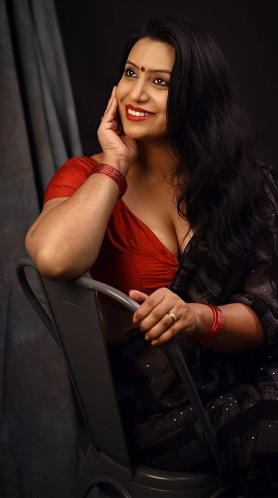 Portrait of a smiling woman in a red blouse and black saree with red bangles, Maya, mallu aunty, saree lover HD phone wallpaper