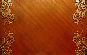 Rustic Brown Wood Texture with Ornate Gold Floral Corner Decorations HD wallpaper