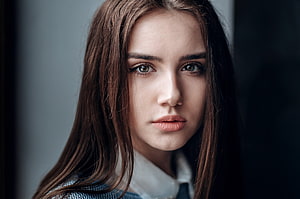 Close-up portrait of a young woman with long brown hair and a serious expression, Unknown Model, babe, model, gorgeous, beautiful, woman HD wallpaper