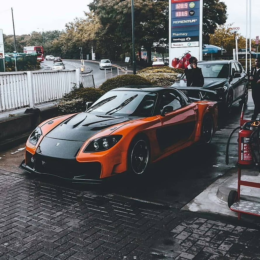 Orange Mazda RX-7 Veilside Widebody at a Gas Station HD phone wallpaper