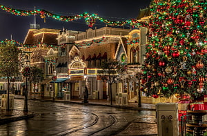 Christmas Tree and Festive Lights on a Victorian Street at Night HD wallpaper