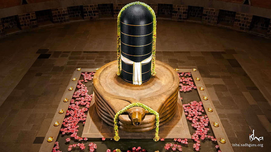 Dhyanalinga Sacred Shiva Lingam at Isha Yoga Center with Flower Offerings and Snake Carving HD wallpaper