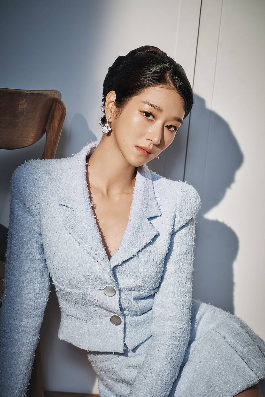 Seo Ye-ji in a light blue tweed suit with elegant updo and floral earrings HD phone wallpaper