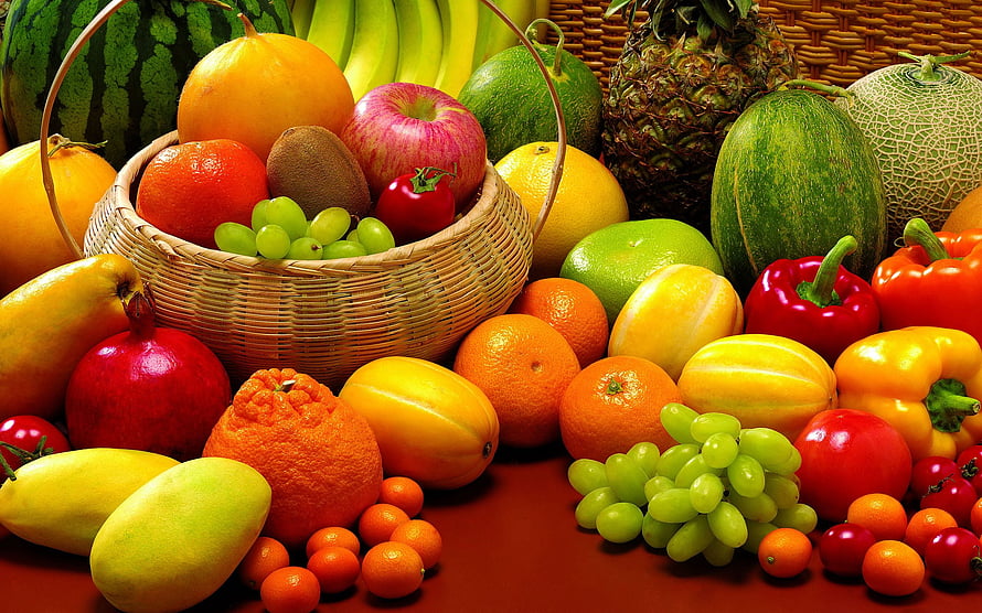 Vibrant Assorted Fresh Fruit Arrangement in Wicker Basket with Melons and Grapes HD wallpaper