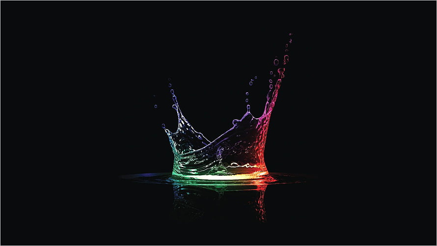 Vibrant Rainbow Water Splash Crown on Black Background HD wallpaper