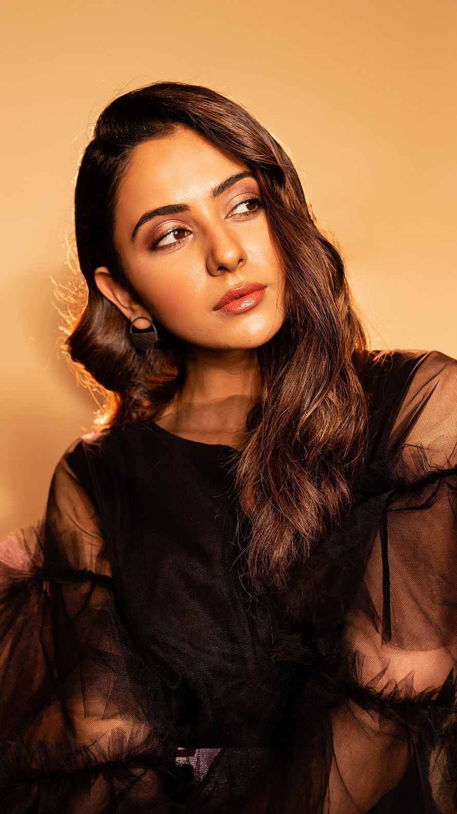 Rakul Preet Singh in Black Tulle Gown with Warm Golden Backlight HD phone wallpaper
