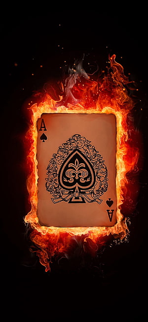 Burning Ace of Spades Playing Card Enveloped in Dramatic Flames and Smoke HD phone wallpaper