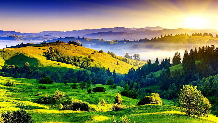 Sunrise Over Misty Green Rolling Hills and Mountain Ranges HD wallpaper