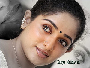 Kavya Madhavan Close-Up Portrait With Traditional Jewelry And Soft Makeup HD wallpaper