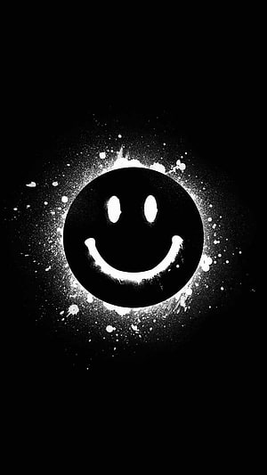 Black and White Smiley Face with Paint Splatter Effect on Dark Background HD phone wallpaper