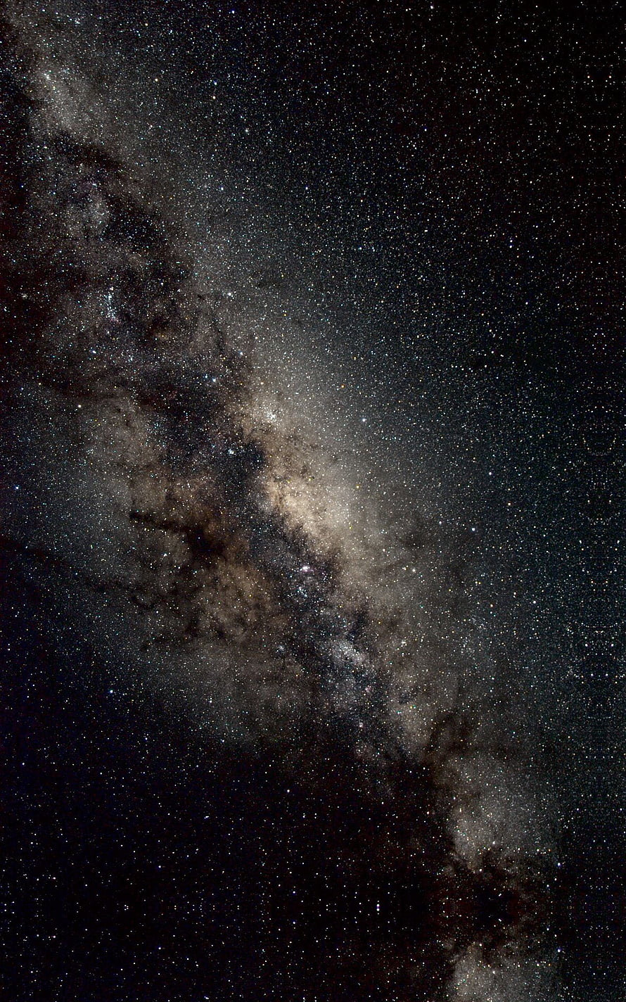 Milky Way Galaxy Core with Dense Star Fields and Dark Dust Lanes in Deep Space HD phone wallpaper