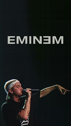 Eminem Live Concert Performance with Microphone and Stage Lighting HD phone wallpaper