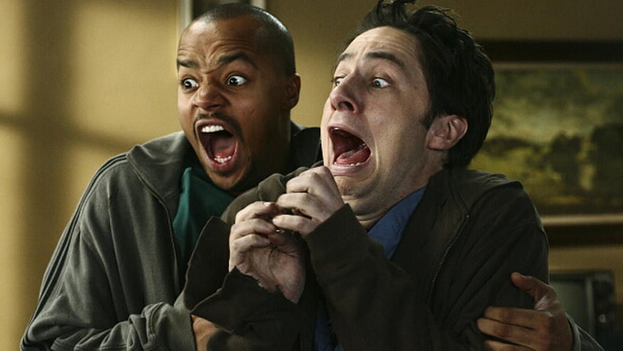 Two Men Screaming in Panic During a Chaotic Physical Comedy Scene HD wallpaper