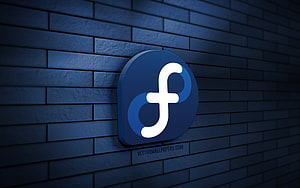 Fedora Linux 3D Logo Mounted on Dark Blue Brick Wall HD wallpaper