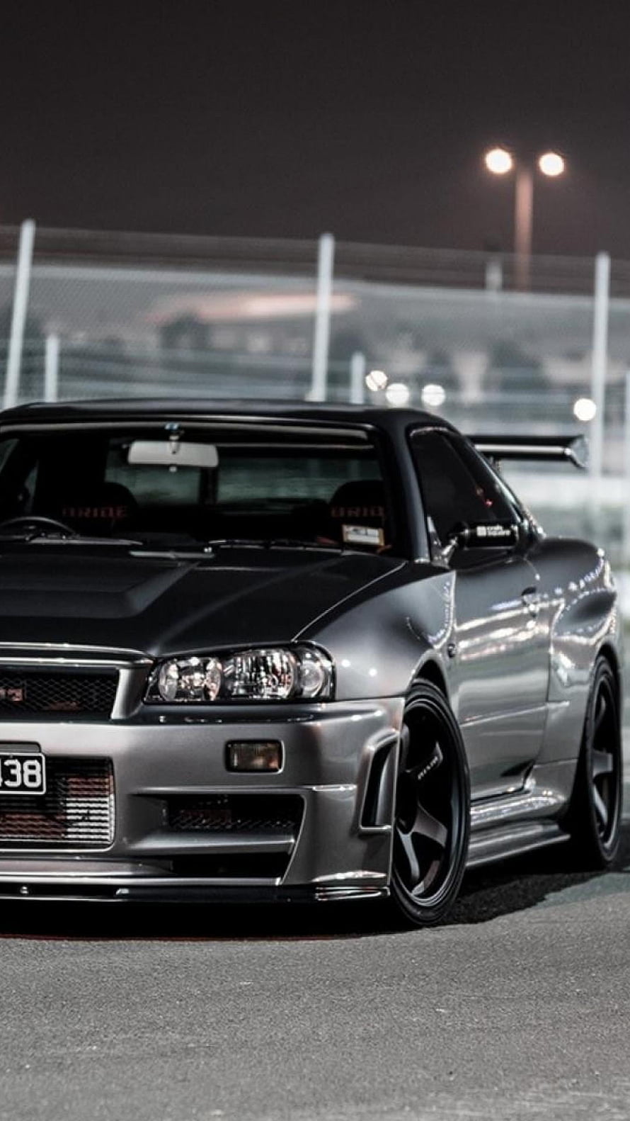 Nissan Skyline GT-R R34 Night Scene with Custom Widebody and Black Wheels HD phone wallpaper