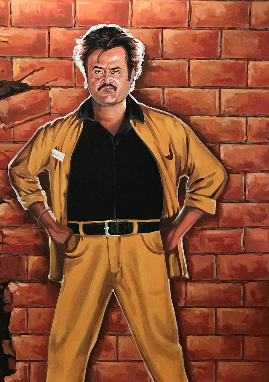 Rajinikanth Baasha Character Portrait in Yellow Suit Against Red Brick Wall HD phone wallpaper