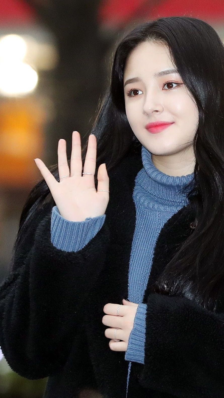 Nancy from Momoland Waving in Black Coat and Blue Turtleneck HD phone wallpaper