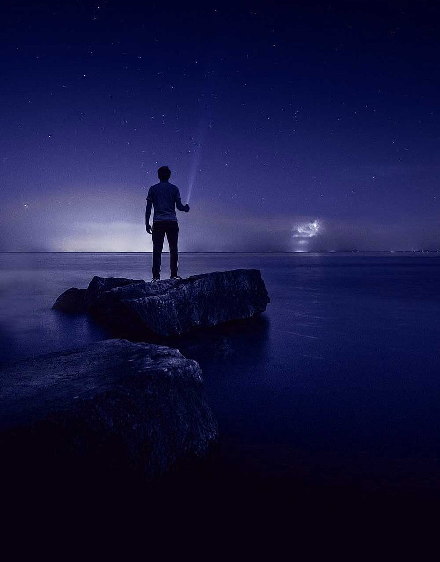 Man Standing on Rock Under Starry Night Sky with Flashlight Beam, Feeling Sad ( Boys & Girls) Whatsapp DP HD phone wallpaper