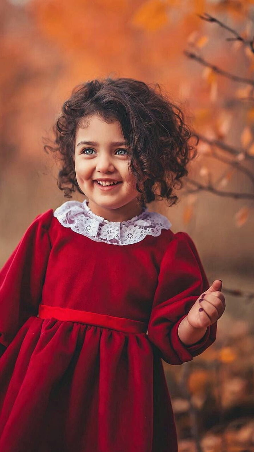 Cute Little Girl in Red Dress with White Lace Collar Smiling in Autumn Forest HD phone wallpaper