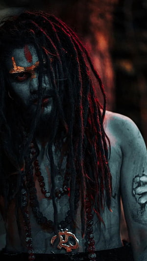 Aghori Sadhu Portrait with Rudraksha Beads and Om Pendant in Dark Cinematic Lighting HD phone wallpaper