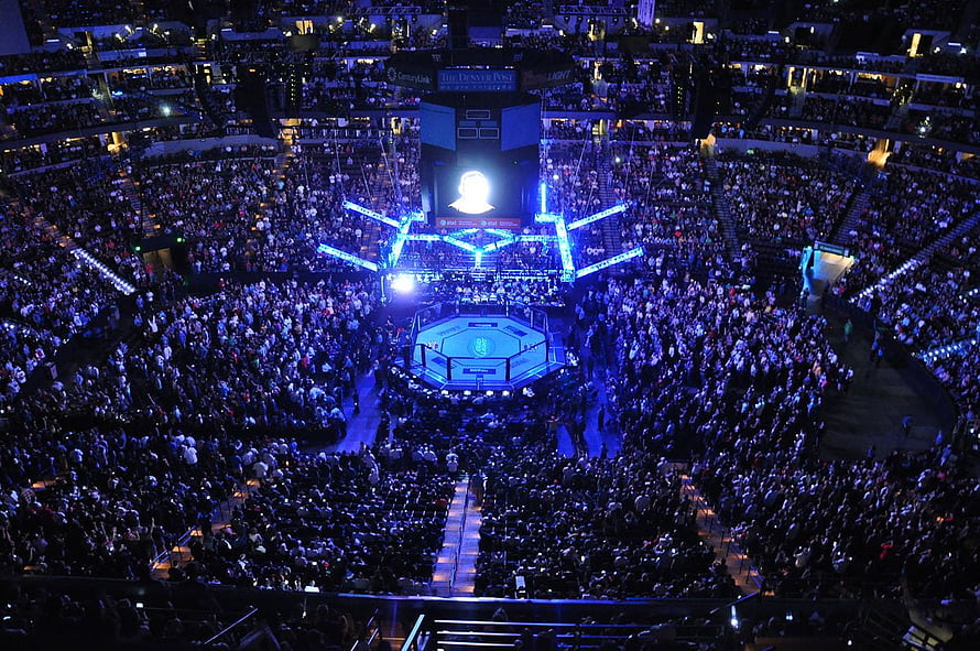 UFC Octagon Arena Event With Massive Crowd And Blue Stage Lighting HD wallpaper